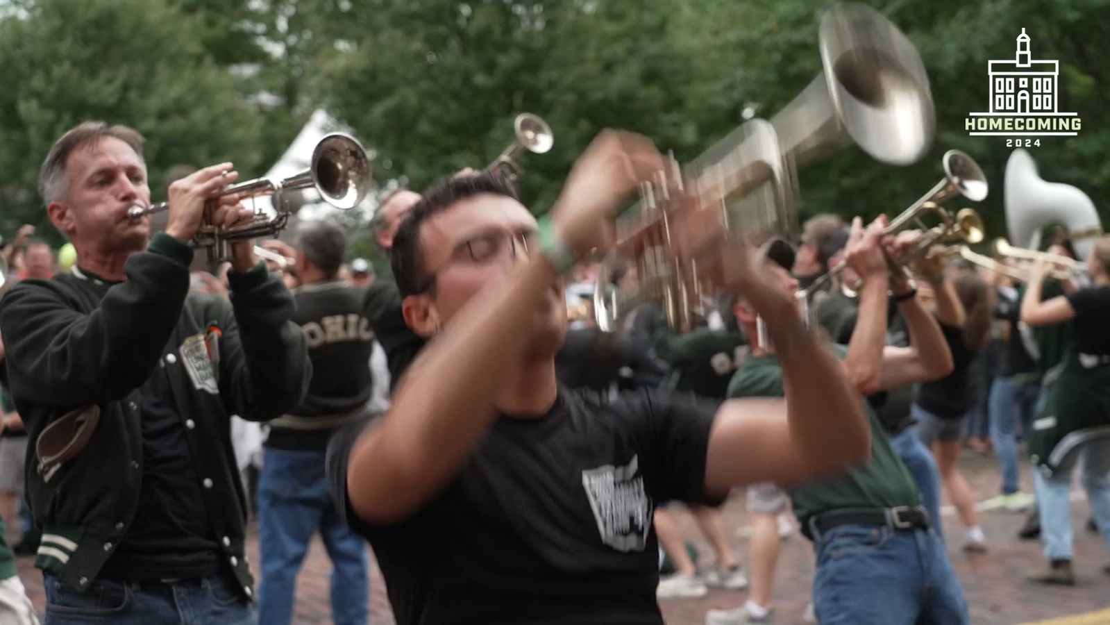 Trumpet players performing during the Ohio University homecoming parade